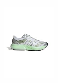 Sport shoe with a mesh upper in white and silver, featuring green translucent midsole, black outsole, and distinct striped design accents.