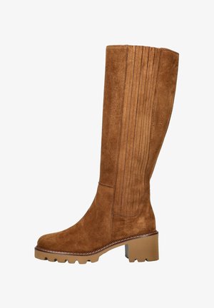 Brown suede knee-high boot with a chunky heel, ribbed side detail, and a rounded toe. Features a thick, textured sole for grip.