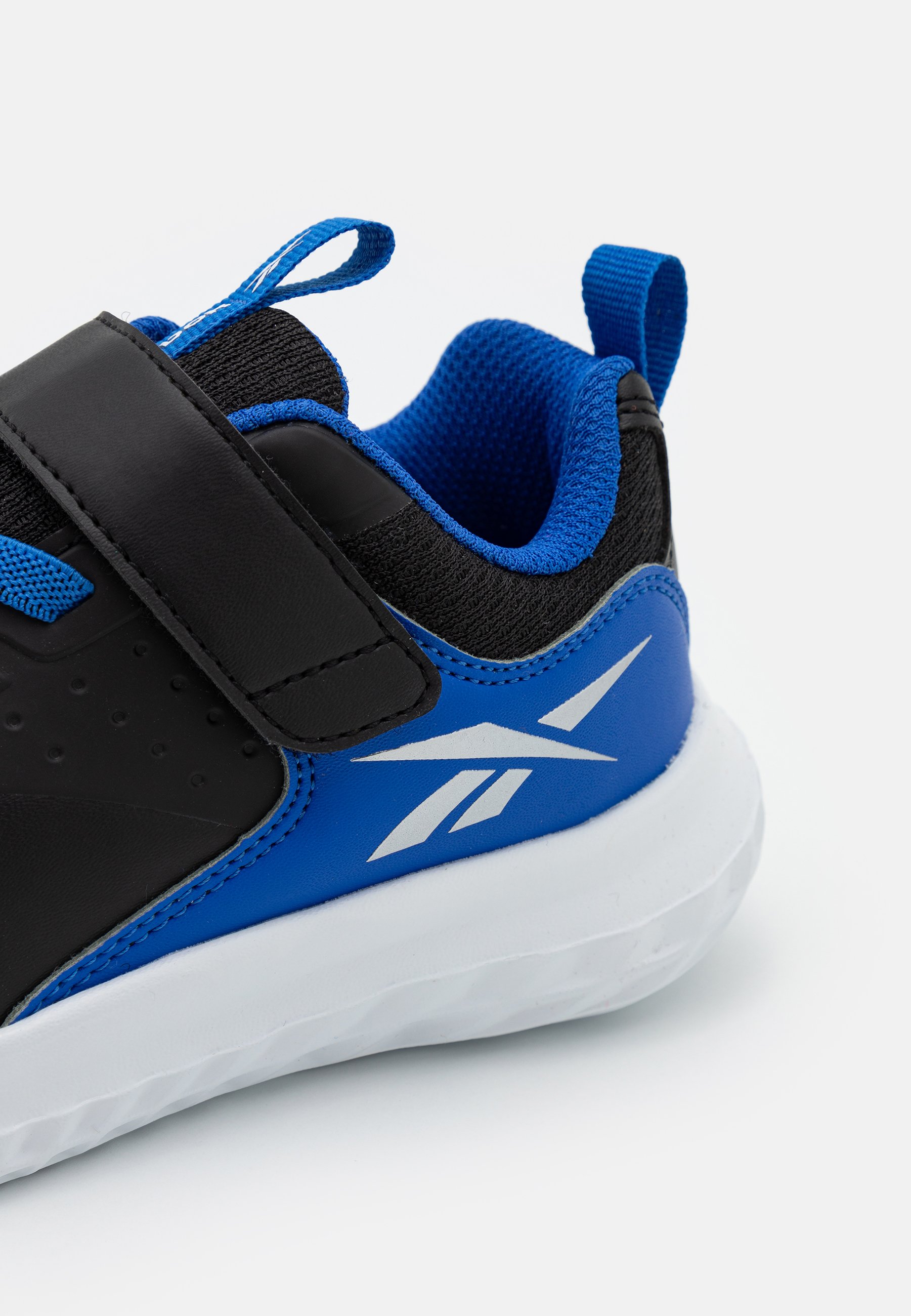 Reebok RUSH RUNNER 4.0 UNISEX - Neutral running shoes - core black/court  blue/silver metallic/black - Zalando.co.uk