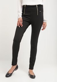 Guess Tygbyxor - black