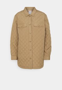 Gequilte beige jas met een kraag, knoopsluiting aan de voorkant en twee borstzakken. Kenmerkt zich door gestructureerde ruitpatronen en lange mouwen.