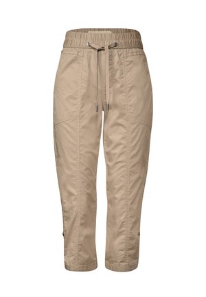 Pantalons beiges raccourcis avec une taille élastiquée et un cordon de serrage, dotés de poches latérales et de accents zippés au niveau des chevilles. Fabriqués en matériau léger.