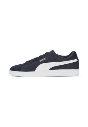 Navy suede sneaker with white leather accents and rubber sole. Features a lace-up design and logo on the side and tongue.