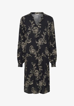 Mustamustriline lillemustriga kleit pikkade varrukatega ja V-kaelusega. Omab beeži lilleääriseid, elastseid mansette ja laia lõiget.