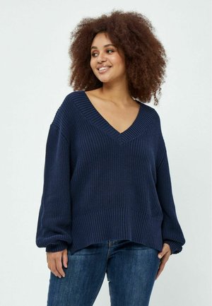 - Sweter