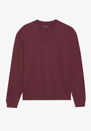 Burgunderfarbenes Langarm-T-Shirt mit Rundhalsausschnitt, lässiger Passform und gerippten Bündchen. Hergestellt aus einem weichen, leichten Baumwoll-Mischgewebe.