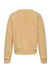Sweatshirt jaune clair à manches longues, avec un col rond et un ourlet côtelé. Matière en coton douce avec une coupe décontractée.