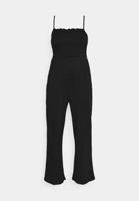 Combinaison sans manches noire avec fines bretelles, corsage ajusté et pantalon à jambes larges sur un fond blanc.