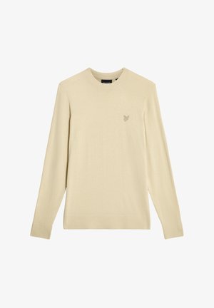 Kremowy sweter z długim rękawem o okrągłym dekolcie, lekka faktura oraz małe haftowane logo ptaka na lewej piersi.