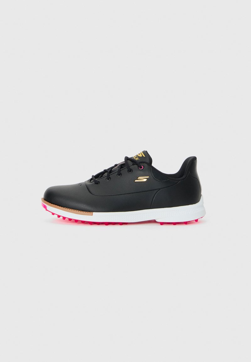 Black golf shoe with white sole, pink spikes, gold "S" logo, and black laces on a plain light background.