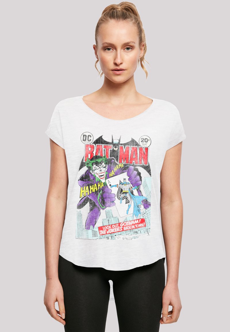 Hvit bomulls T-skjorte med grafikk av Batman og Joker, med fargerik tekst fra tegneserier. Løs passform, korte ermer, rund hals.