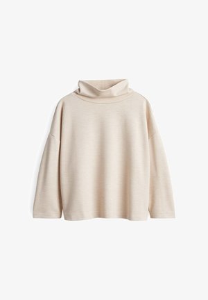 Beige oversized trui met een brede col, geribbelde textuur en verlaagde schouders, met lange mouwen en een ontspannen pasvorm.