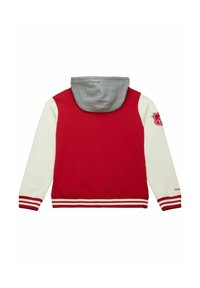Roter und cremefarbener Hoodie mit grauem Kapuzen. Verfügt über gerippte Bündchen und Saum mit roten und weißen Streifen. Enthält ein Patch auf der linken Schulter.