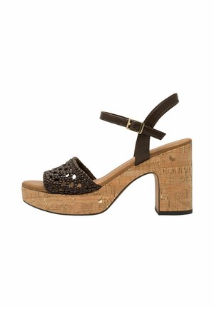 Sandales à plateforme marron avec talon en liège, dessus tissé, bride de cheville réglable et semelle intérieure lisse pour le confort.