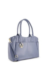 Light blue textured leather tote bag with gold hardware, two top handles, adjustable shoulder strap, and a round logo accent.