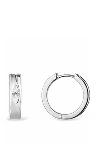 Silver hoops örhängen med en slät yta, med en liten diamantdetalj på ena sidan och en säker låsning. Minimalistisk design.