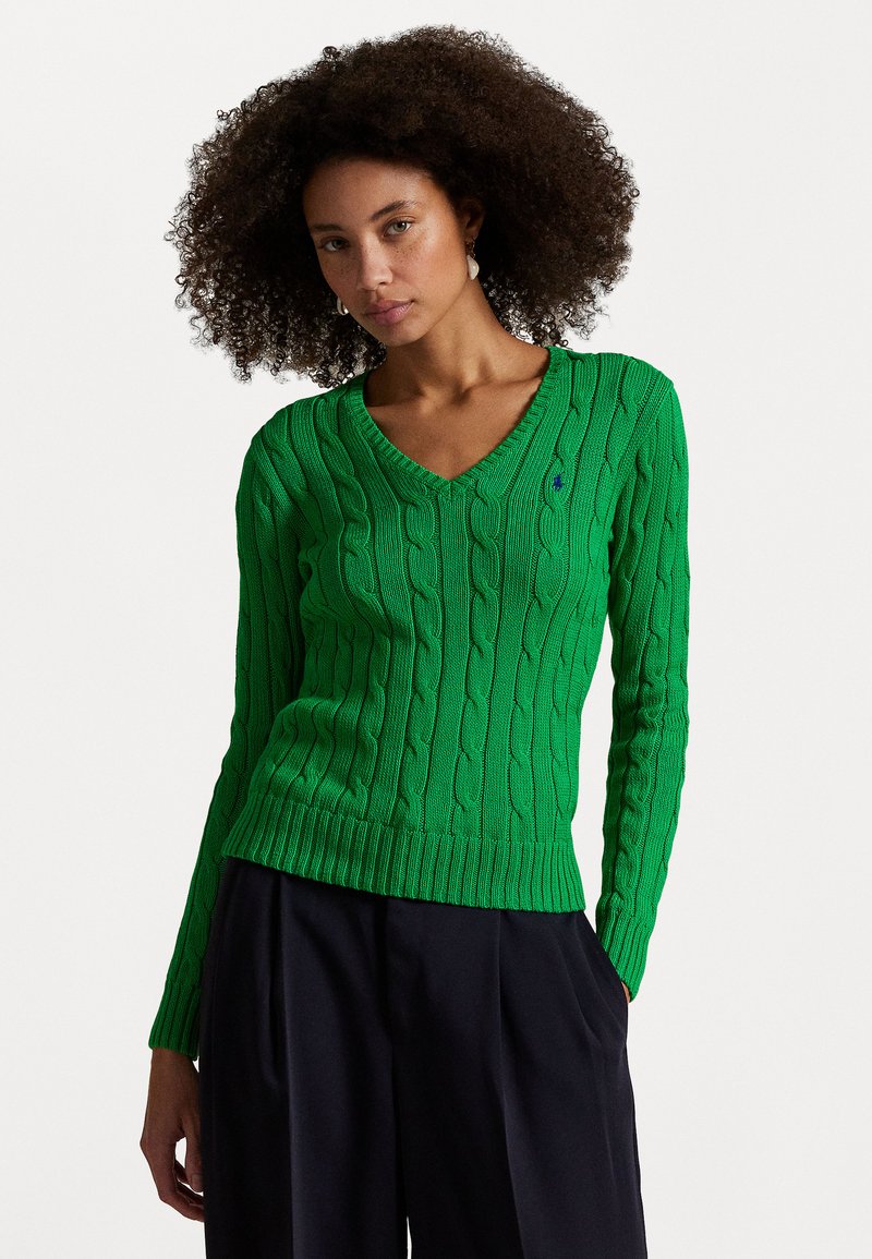 Green knitted sweater with cable pattern, V-neck design, ribbed cuffs and hem, featuring a small logo accent on the left chest.