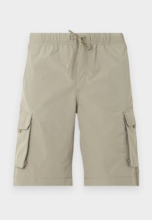 Bež kavbojske bermude dolžine do kolen z elastičnim pasom, vezalko za zapiranje in žepi s poklopci na obeh straneh.