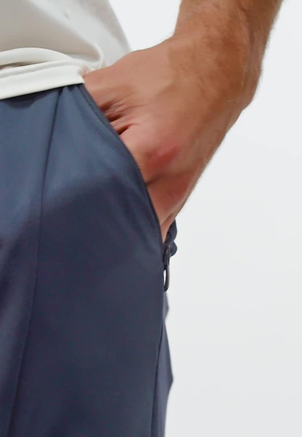 DESIGNED FOR HYBRID - Tracksuit bottoms - aurora ink3