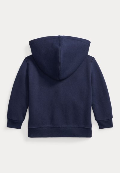 Sudadera con capucha azul marino, mangas largas, puños y bajo de canalé, vista desde atrás sobre un fondo claro y liso.