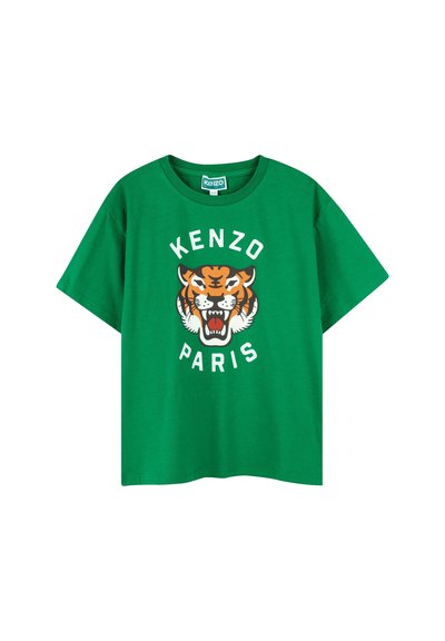 T-shirt en coton vert arborant un grand graphique de tigre orange avec des détails noirs et le texte "KENZO PARIS" en lettres blanches circulaires.