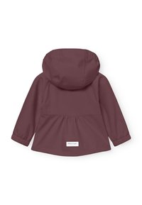 Veste à capuche bordeaux avec des poignets élastiques, un ourlet en peplum, une texture lisse et une étiquette logo en bas. La vue arrière met en avant les détails de conception.