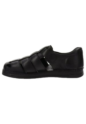 Sandali in pelle nera con design open-toe, multiple cinghie che attraversano il piede e superficie testurizzata. Suola in gomma robusta con leggera elevazione.