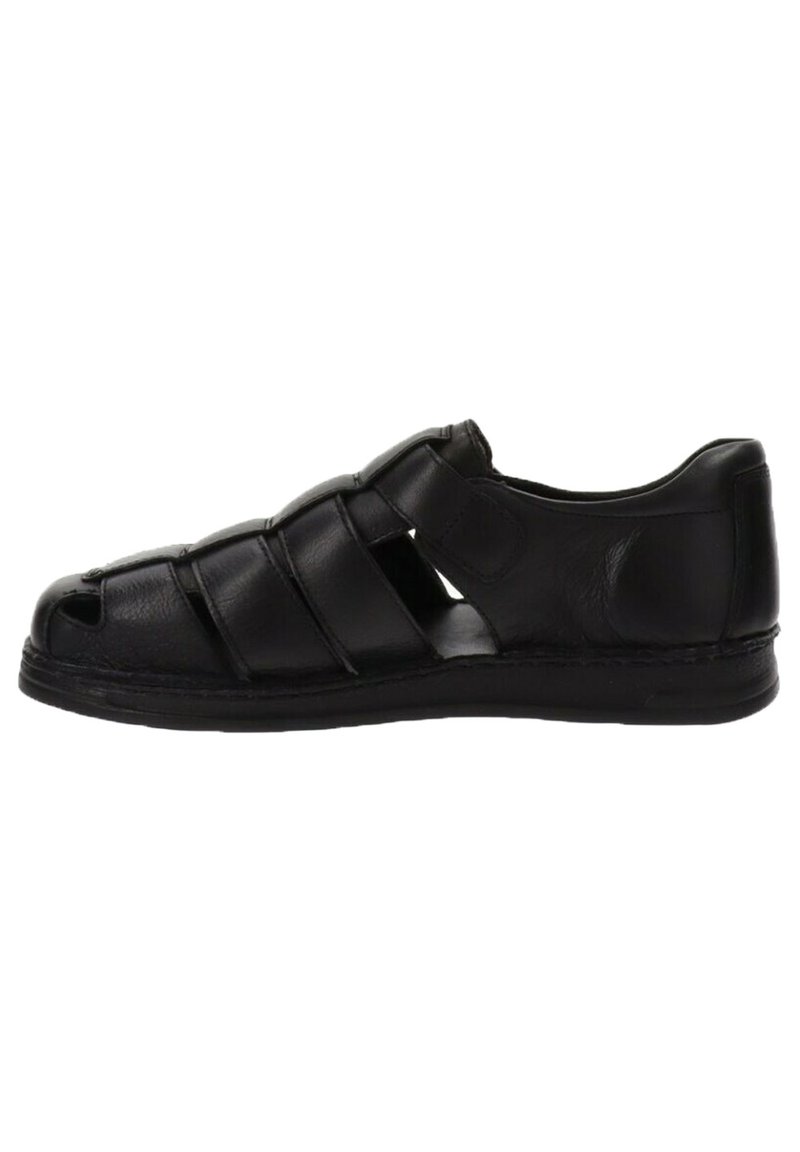 Sandali in pelle nera con design open-toe, multiple cinghie che attraversano il piede e superficie testurizzata. Suola in gomma robusta con leggera elevazione.