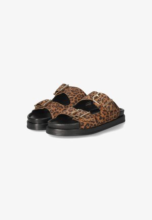 Leopard print sandals featuring two adjustable buckles, black rubber outsole, and an open-toe design for breathability.