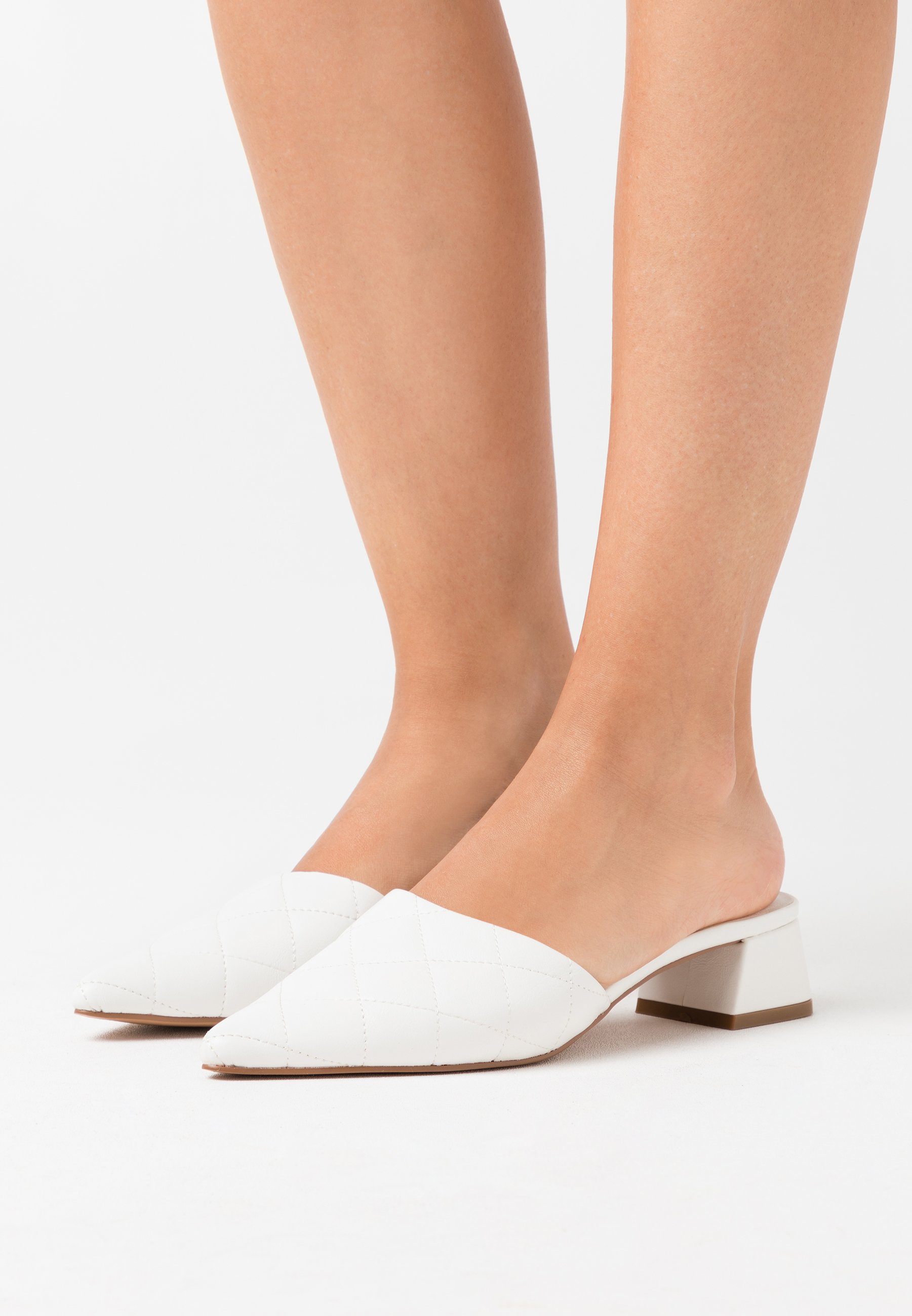 quilted white mules