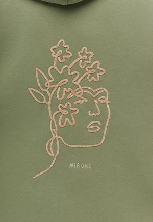 Felpa verde con un design ricamato in beige raffigurante un volto adornato da fiori, con la scritta "MIRONS" sottostante. Texture liscia.