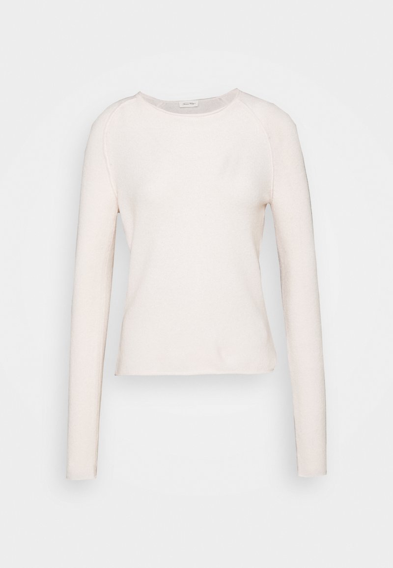 Helles rosa Langarmshirt aus weichem Stoff. Verfügt über einen runden Ausschnitt und einen verkürzten Saum mit minimalen Nähten und einer glatten Textur.