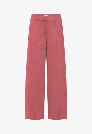 Pantalons larges de couleur rose poussiéreux, fabriqués en tissu texturé. Dotés d'une ceinture structurée et de pli du devant pour un design soigné.