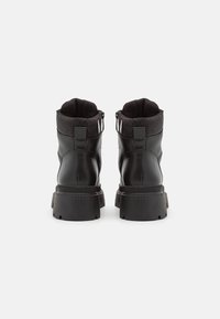 Tamaris Botines con plataforma - black