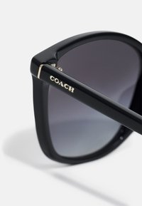 COACH Sluneční brýle - black