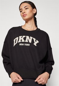 DKNY VARSITY PUFF LOGO SLEEVE - Sweatshirt - black/oat