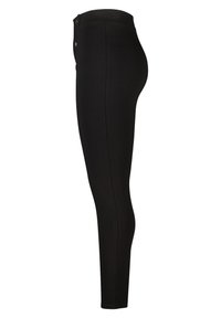 Zwarte skinny broek met hoge taille en zijknopen, zijaanzicht op een witte achtergrond.