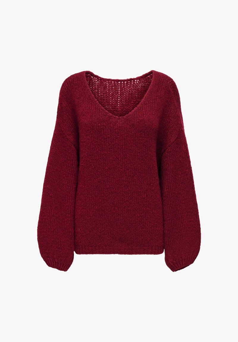 Pull tricoté rouge profond, coupe ample, col en V et manches longues bouffantes.