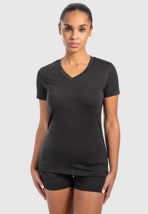 Black short-sleeve V-neck T-shirt made of soft jersey fabric, featuring a fitted design and paired with black shorts.