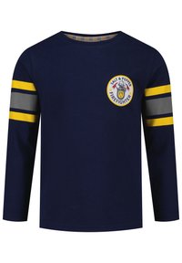Marineblaue Langarmbluse mit gelben und grauen Streifenakzenten. Mit "Salt & Pepper Firefighter" Logo auf der Brust. Aus weichem Baumwollmaterial.