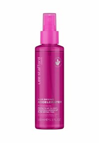 Roze kunststof sprayfles met een pompkap, gelabeled "Haardrogende Versneller," bevat 150 ml product. Kenmerken vegan en diervriendelijke iconen.
