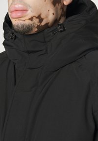 Carhartt WIP Parka - black