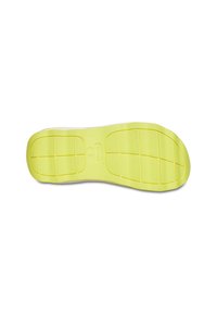 Zool van een schoen in felgeel rubber, met een getextureerd oppervlak met rasterpatronen en afgeronde randen voor grip.