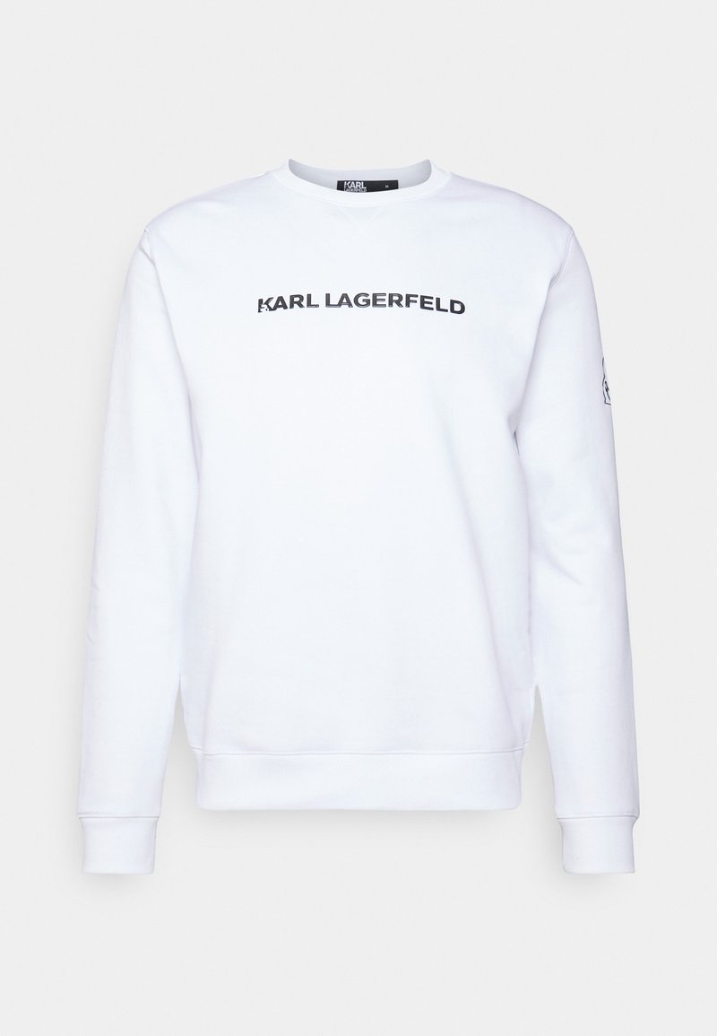 Sudadera de algodón blanco con cuello redondo, mangas largas y logo negro "KARL LAGERFELD" en el frente. Puños y dobladillo acanalados.