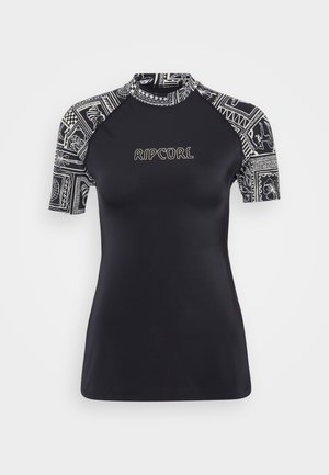 Short-sleeve black rash guard with patterned sleeves. Features Rip Curl logo in gold. Material is smooth and flexible, suitable for water activities.