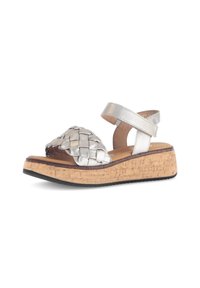Silver woven leather wedge sandal with a cork platform and synthetic sole. Features an adjustable strap for secure fit.
