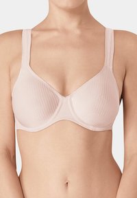 Reggiseno rosa chiaro con ferretto, realizzato in tessuto a coste testurizzato, con spalline larghe e regolabili e un design a coppa classico. Bordo liscio e hardware minimale.