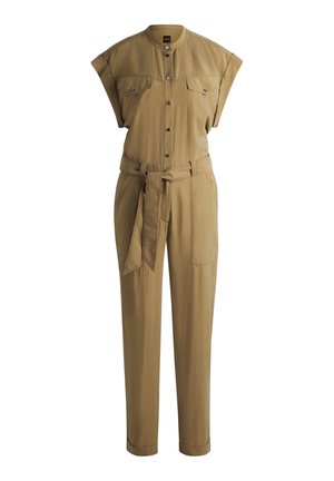 Olive green jumpsuit with short sleeves, button front, two chest pockets, a tied waist, and tapered legs. Smooth fabric with a casual design.
