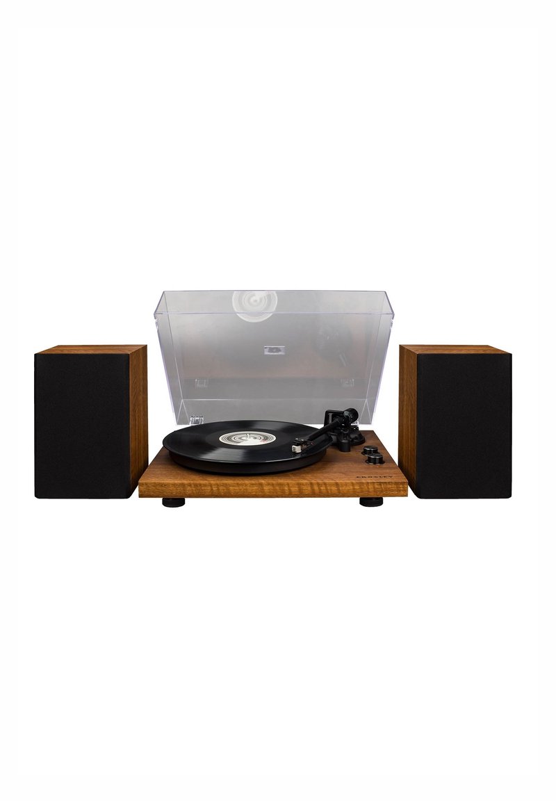 Plateau tournant avec une base en bois, une couvercle en plastique transparent, un disque vinyle noir, deux enceintes noires et des boutons de contrôle sur le côté.