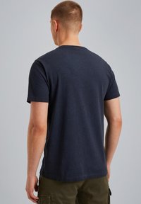 Navy blue short-sleeve T-shirt made of cotton, featuring a relaxed fit and a crew neckline, with a smooth finish and no visible patterns.